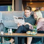 Blog-Hotel-Newspaper-with-person-Gastfreund-GmbH