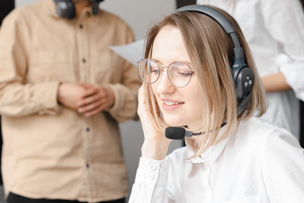 customer care employee talk on the phone via headset