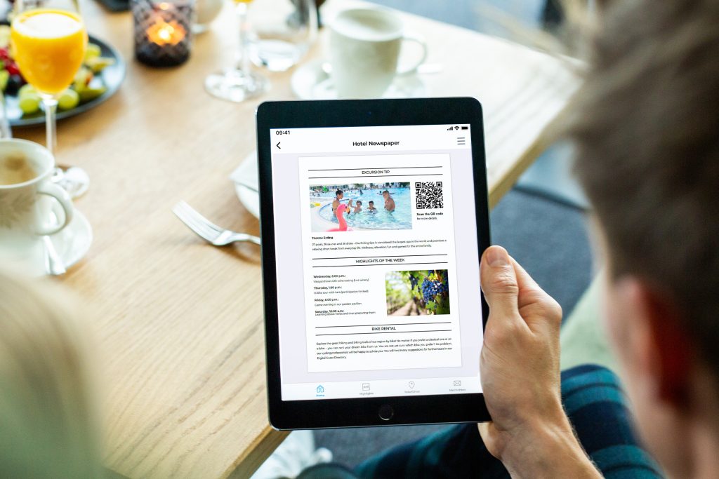 Hotel-Newspaper-iPad-breakfast-table-Gastfreund-GmbH